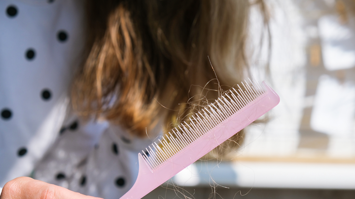 Hair fall in Women: Causes and Treatment options